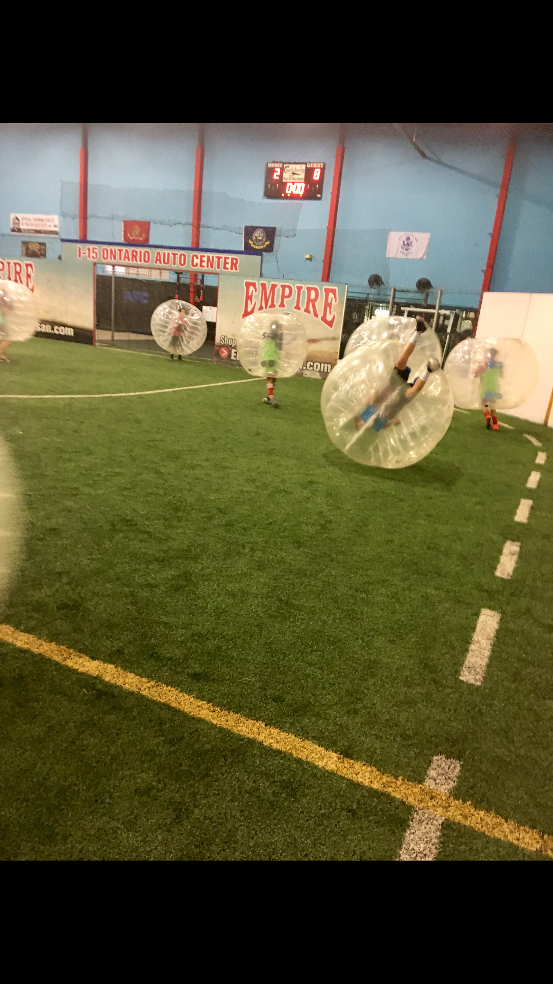 Indoor bubble soccer action at Empire sports facility
